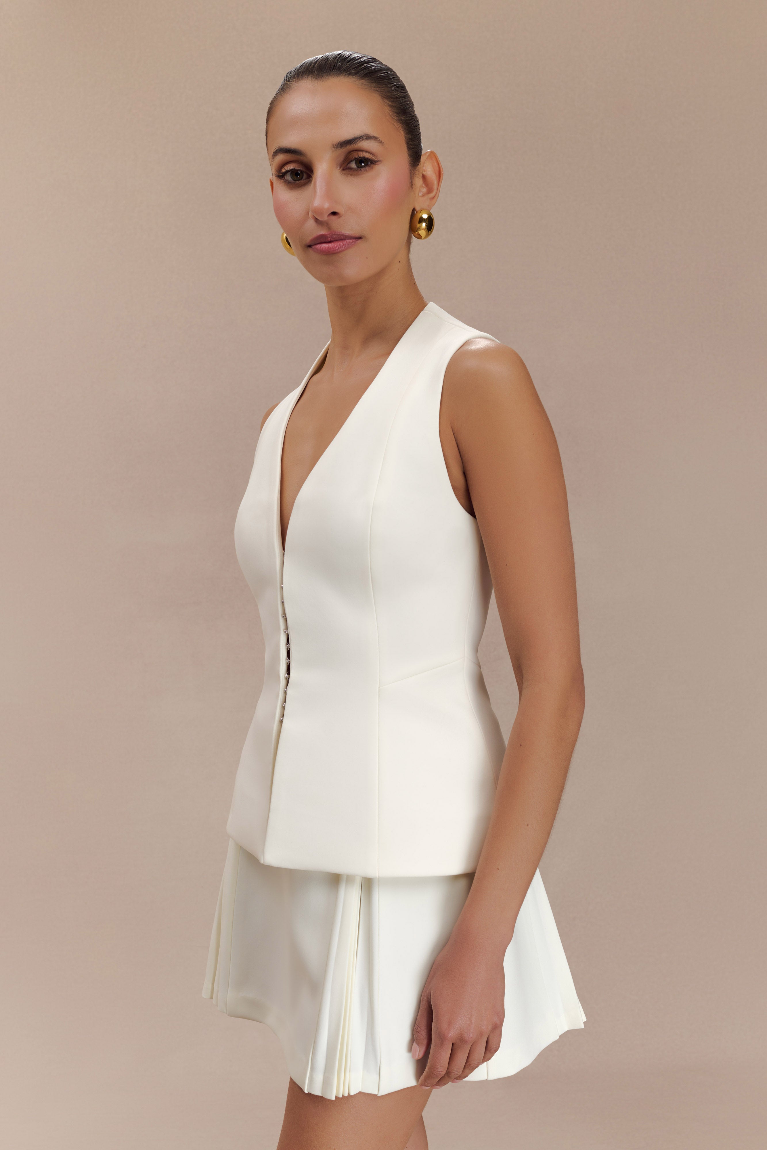 Structured Vest Top with V Neck & Flared Hem | Melinda Ivory