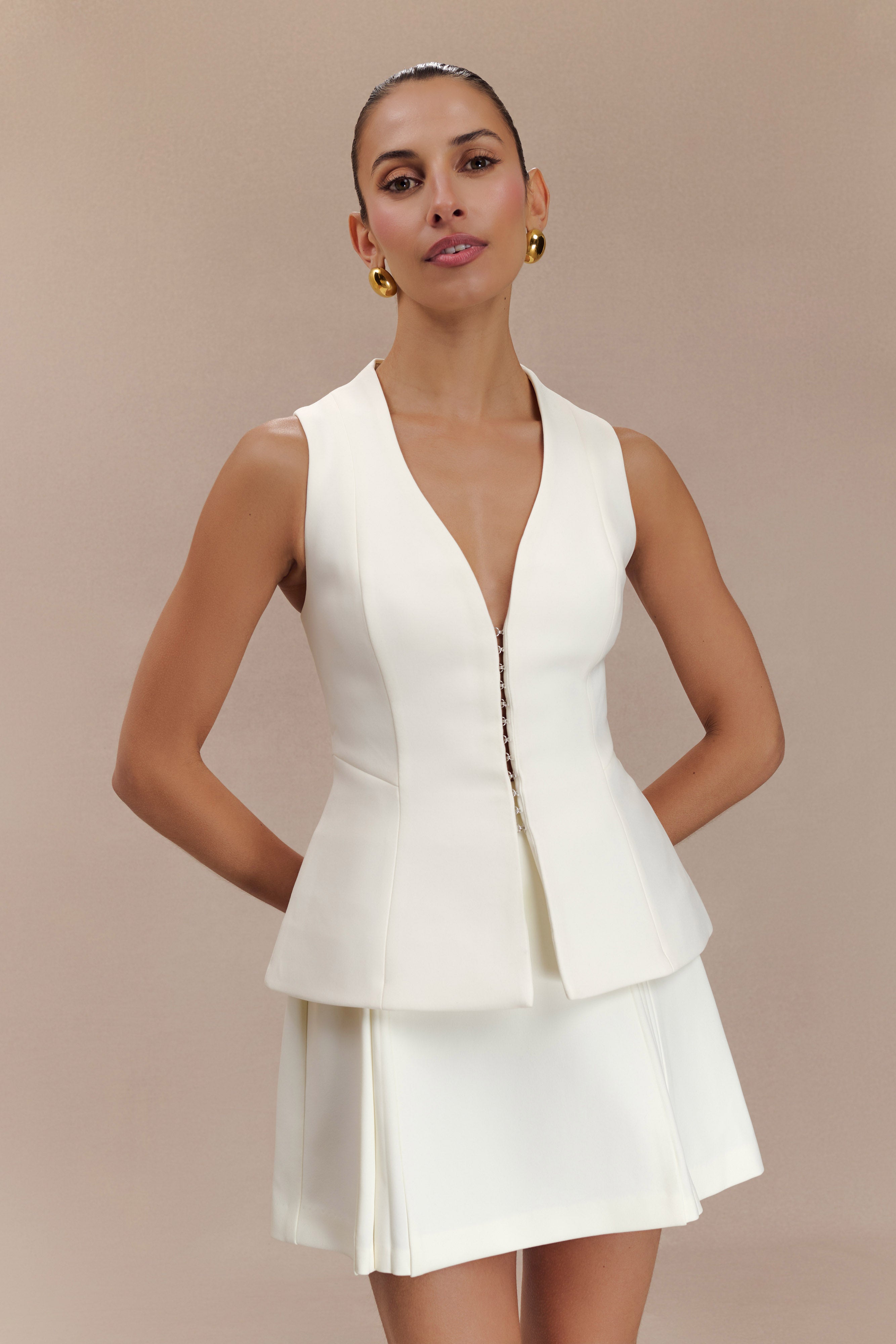 Structured Vest Top with V Neck & Flared Hem | Melinda Ivory