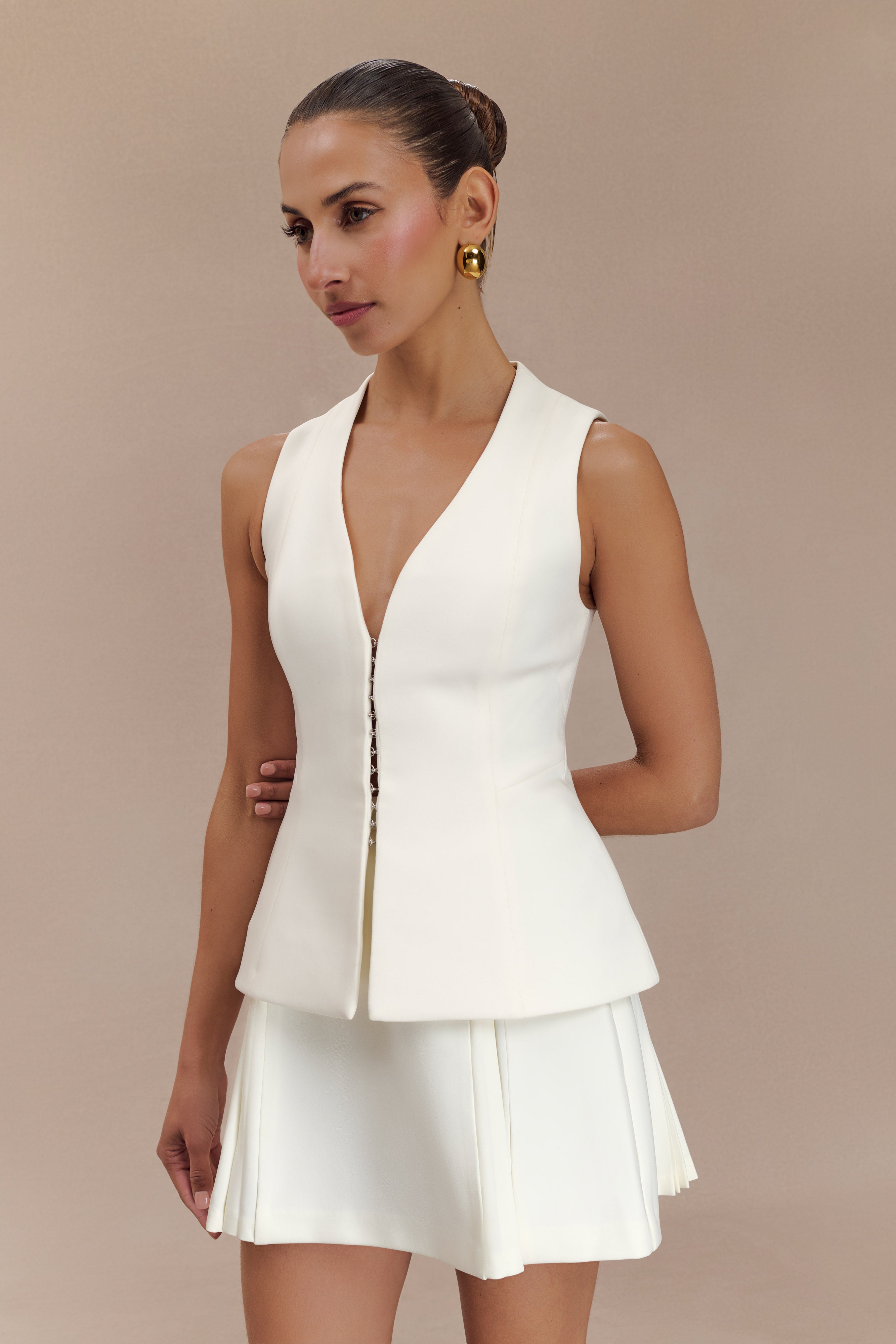Structured Vest Top with V Neck & Flared Hem | Melinda Ivory