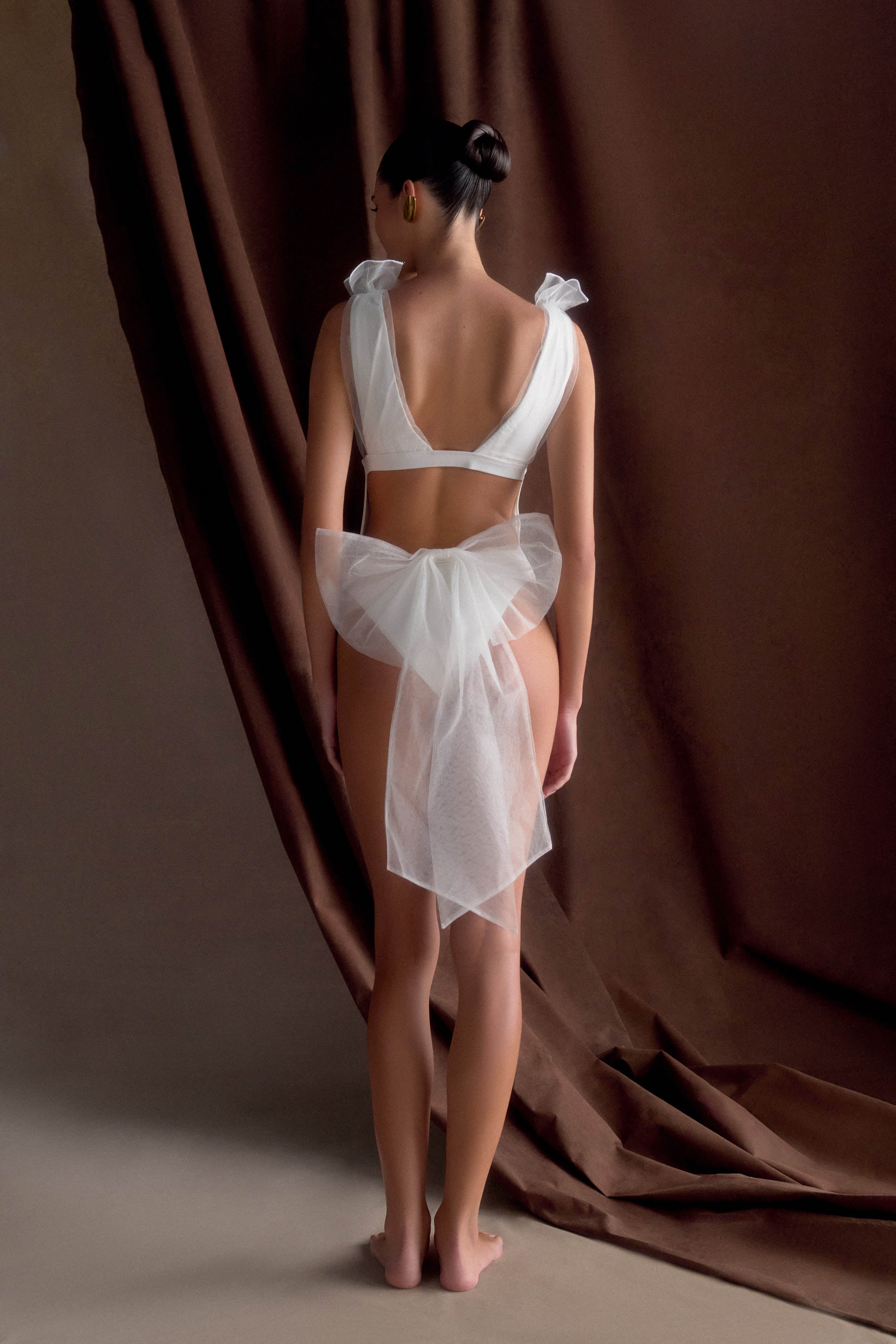 Elegant Plunge One Piece Swimsuit with Bow & Open Back | Sybil Ivory