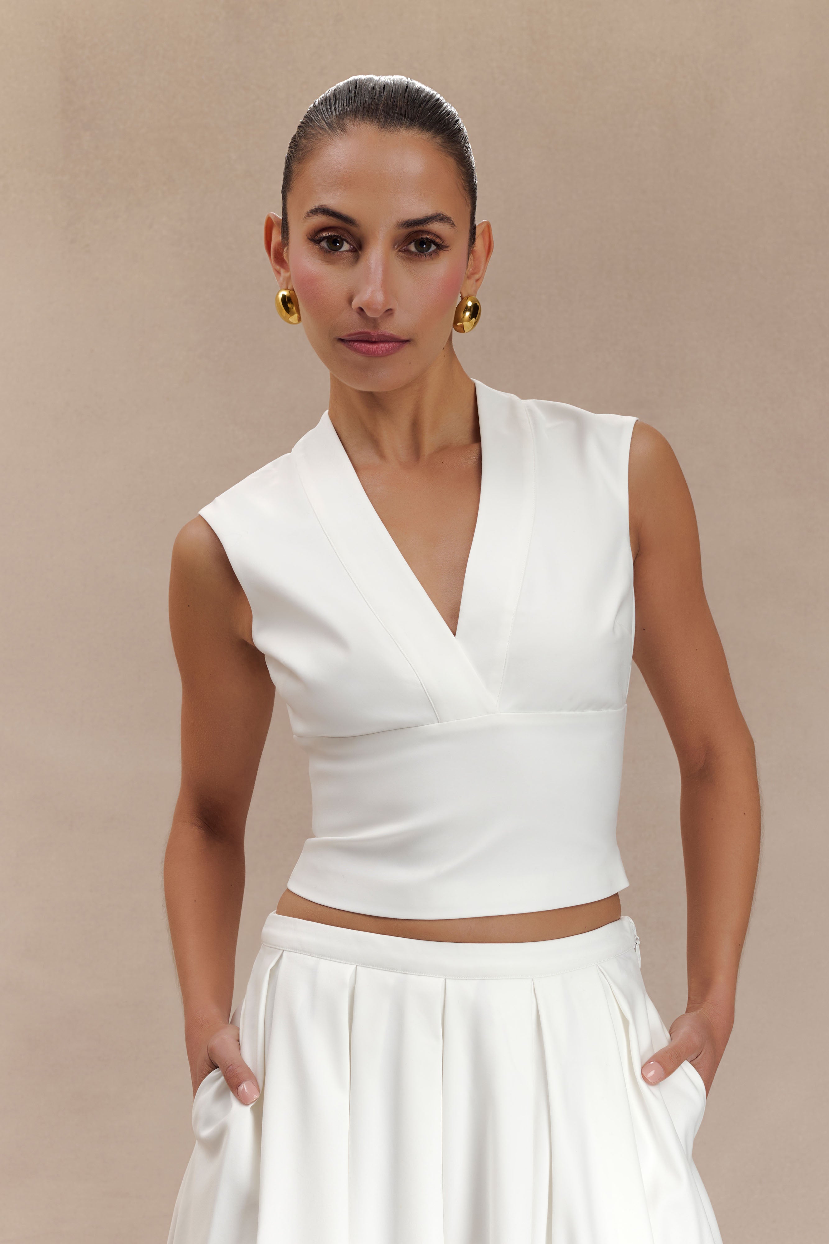 Elegant Sleeveless Cross Over Top with V Neck & Open Back | Jemima