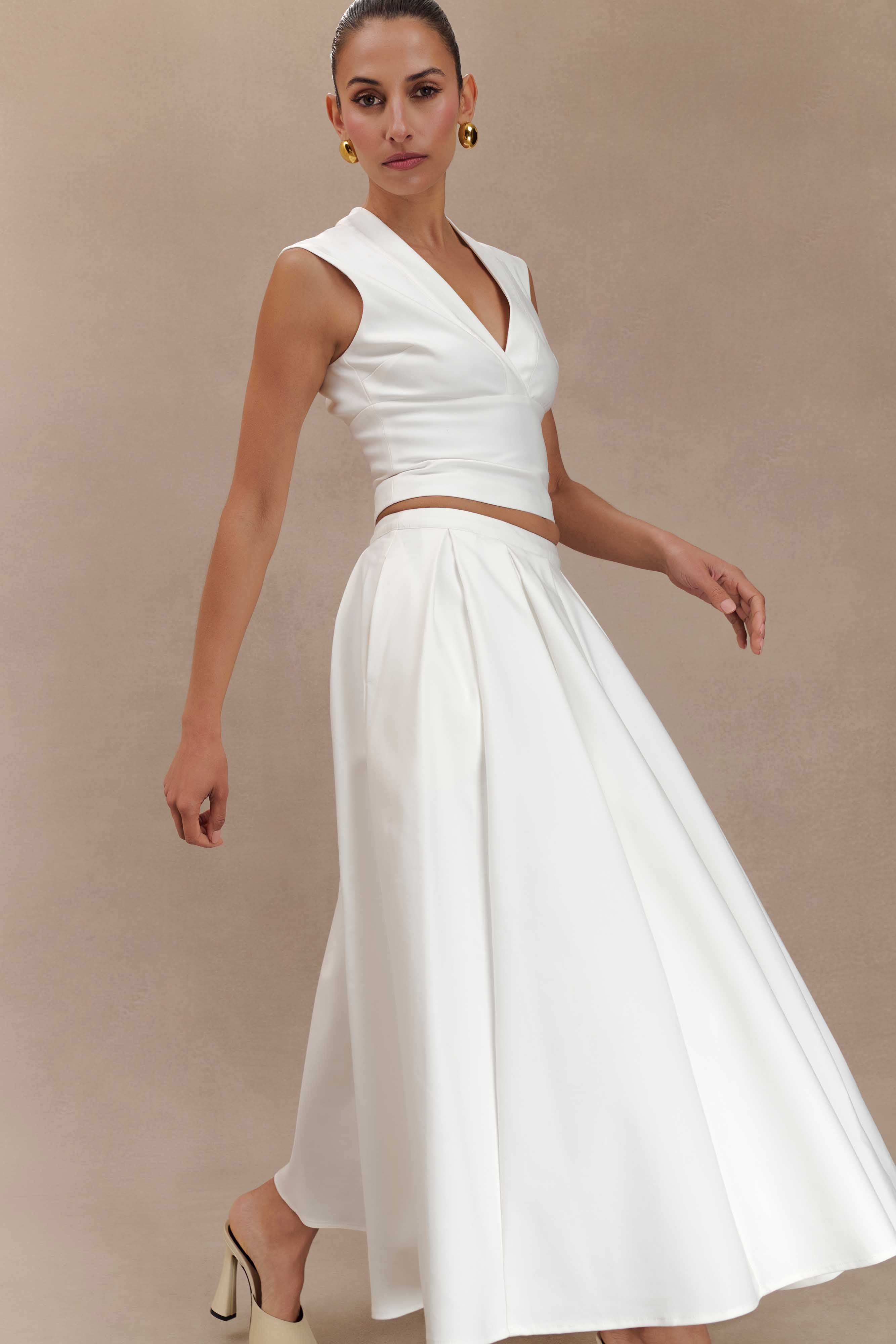Elegant Sleeveless Cross Over Top with V Neck & Open Back | Jemima