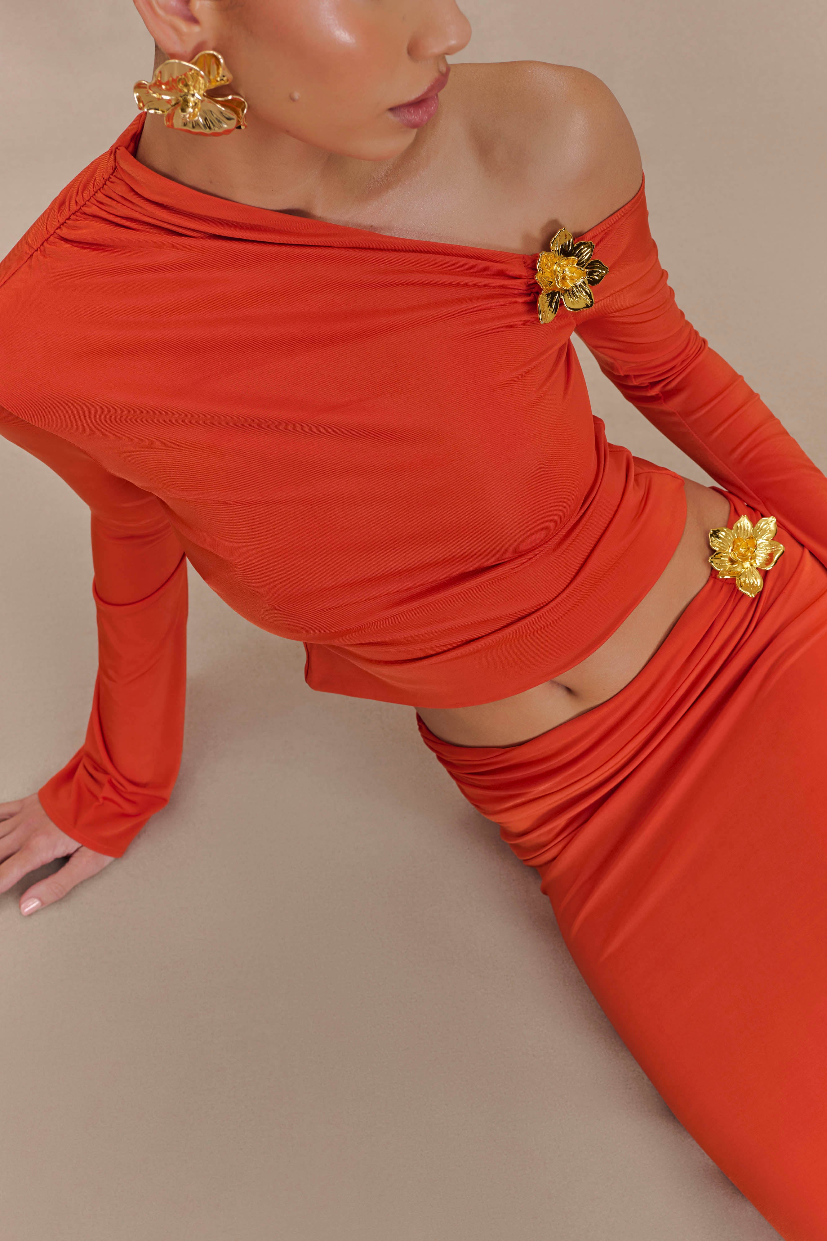 Floral Hardware Asymmetrical Long Sleeve Top | Ainsley