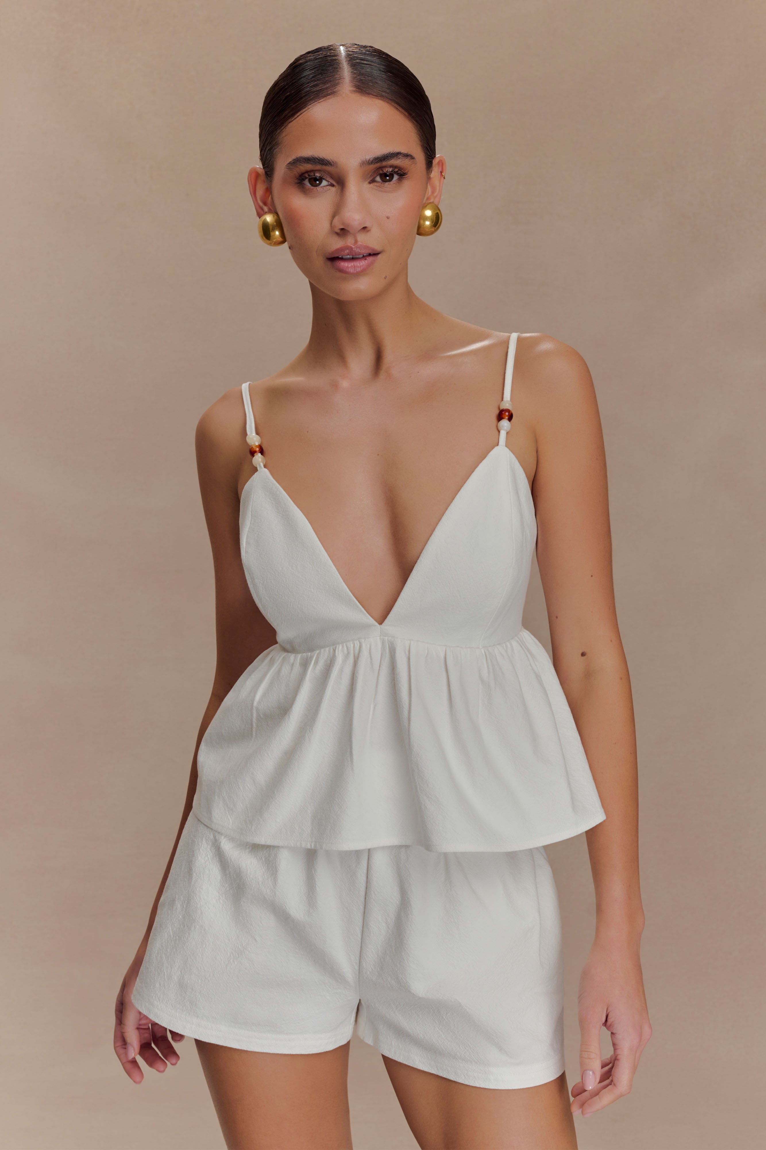 White Cotton Beaded Top with V-Neck & Peplum Hem | Janayia