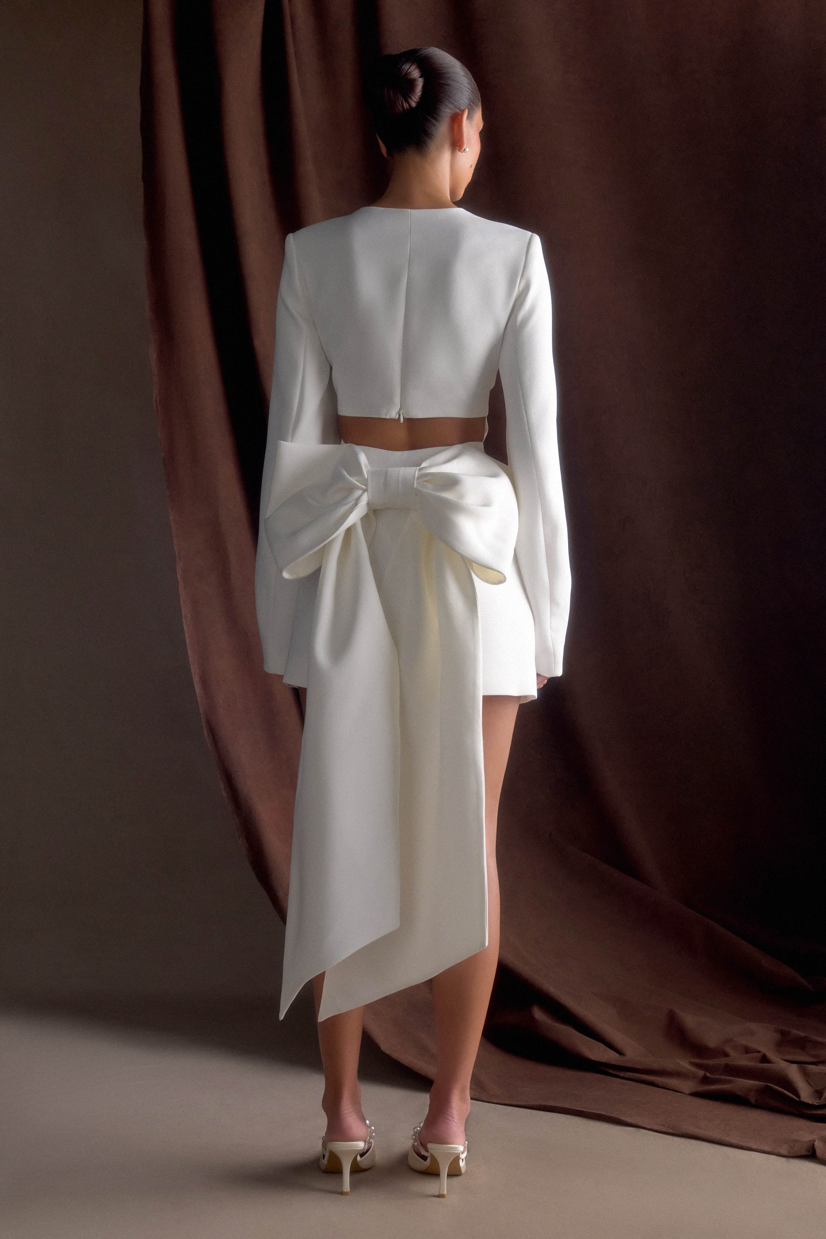 Elegant Ivory Mini Dress with Bow Detail & Plunge Neckline | Rosanna