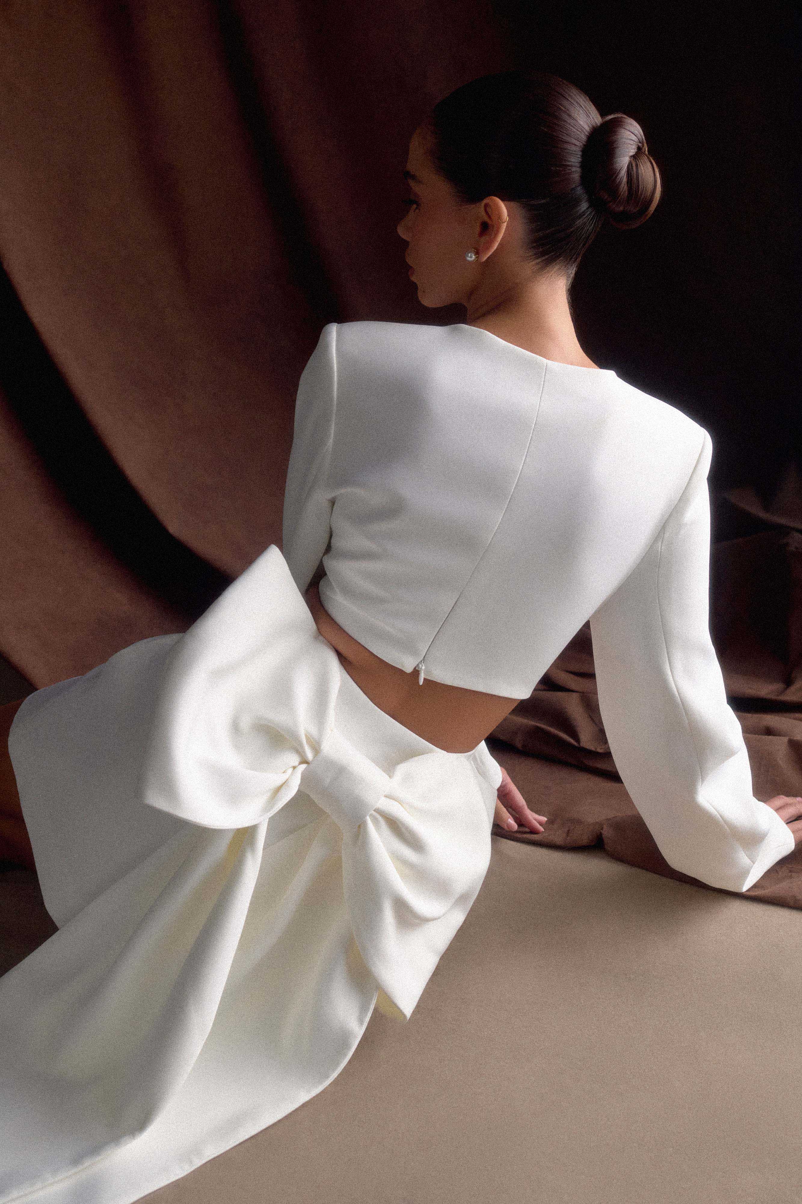 Elegant Ivory Mini Dress with Bow Detail & Plunge Neckline | Rosanna