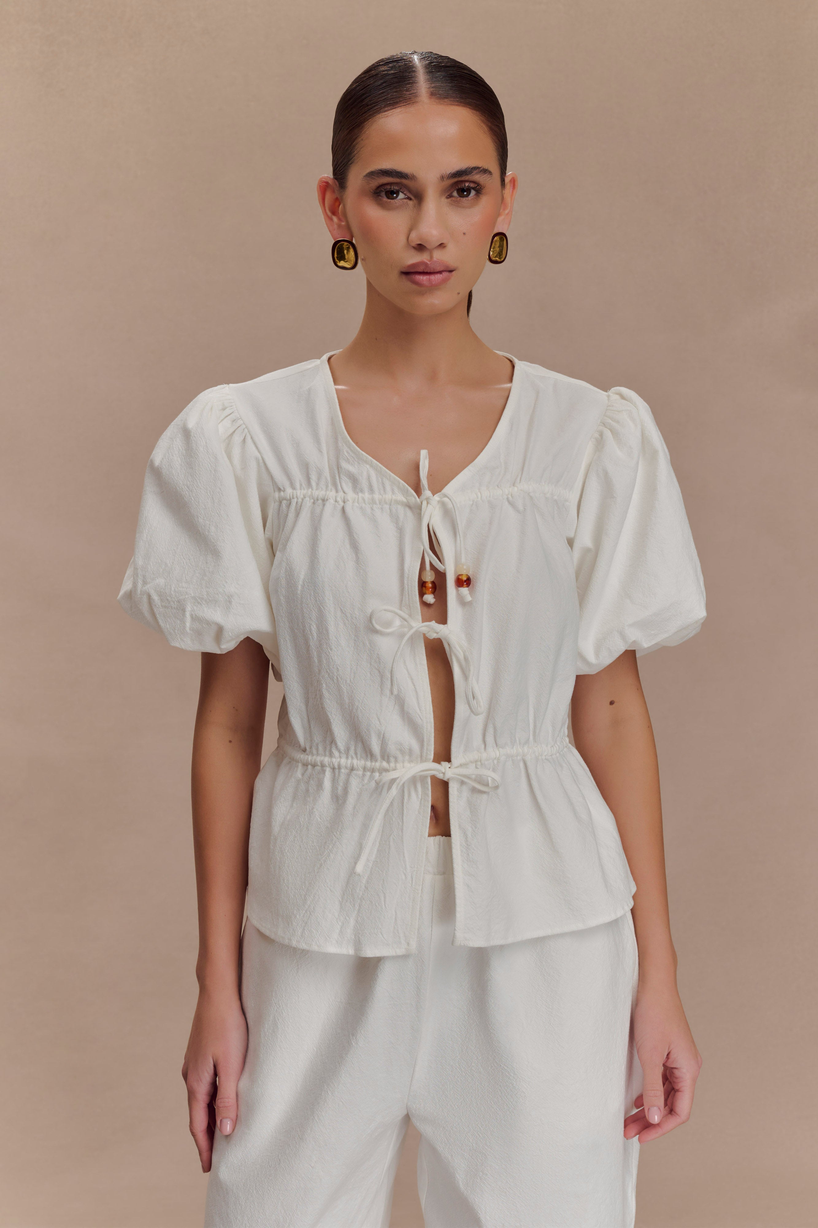Puff Sleeve Cotton Top with Peplum Silhouette | Emilie